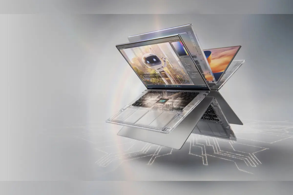 מחשב נייד שקוף ומתכתי עם שבב RTX Spark של אנבידיה, על רקע אפור עם קווי מעגלים זוהרים